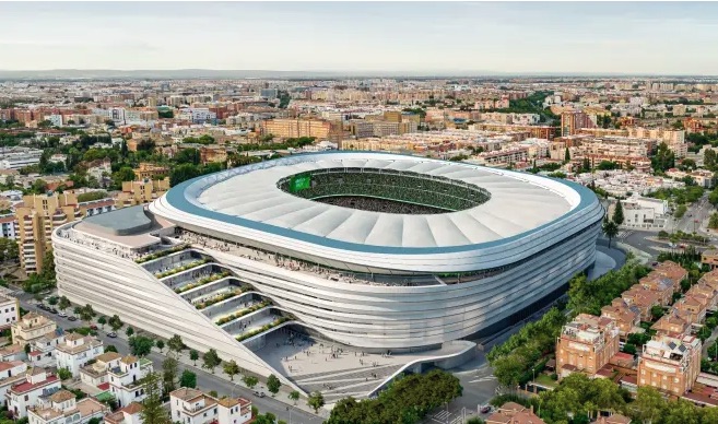 Aerial view of a new stadium in a city.