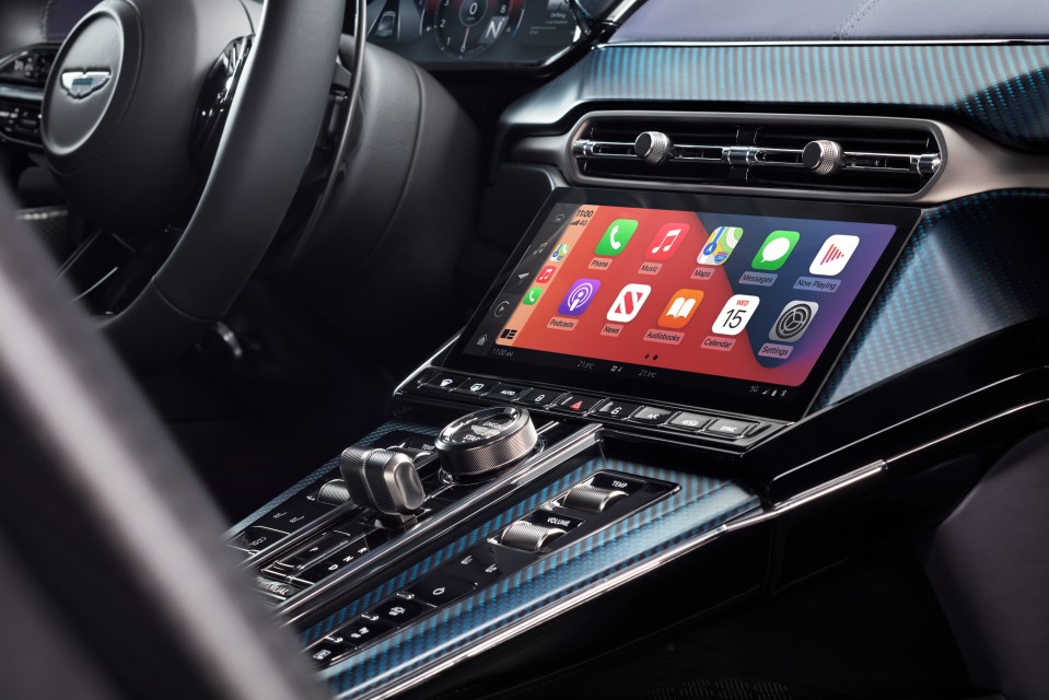 Aston Martin 2025 Vantage Roadster interior with infotainment screen.