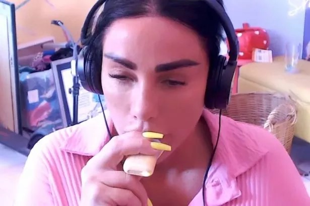 Woman wearing headphones vaping.