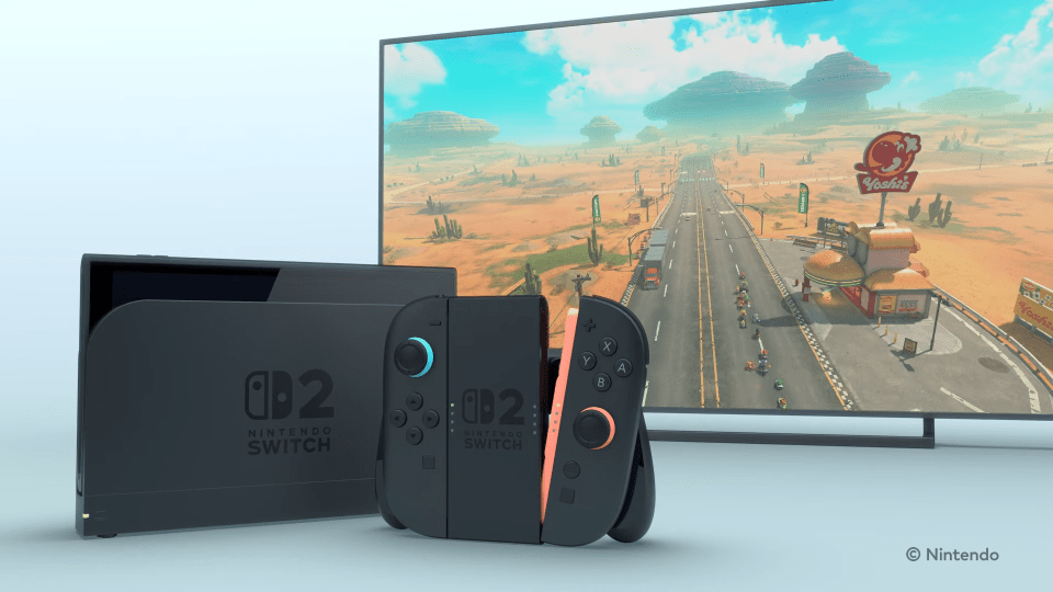 Nintendo Switch 2 console and controllers displayed with a game playing on a TV screen.