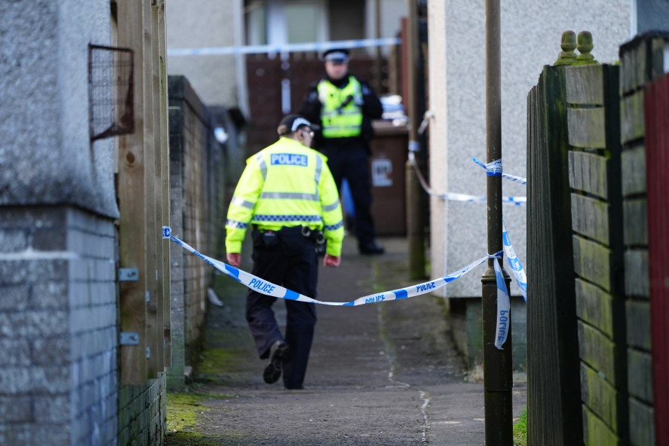 A police cordon at the scene on Harburn Drive, West Calder, after the deaths of a 36-year-old man and a six-year-old girl whose bodies were found at a property in West Lothian. Police said the deaths are being treated as unexplained and post-mortem examinations will take place in due course. Picture date: Tuesday January 21, 2025. PA Photo. See PA story POLICE WestCalder. Photo credit should read: Jane Barlow/PA Wire