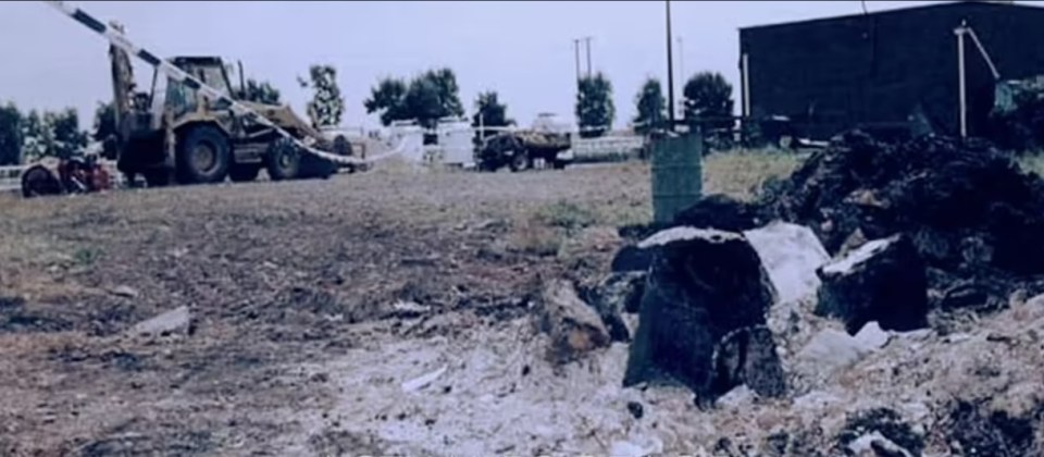 A bulldozer and other machinery at a pumping station.