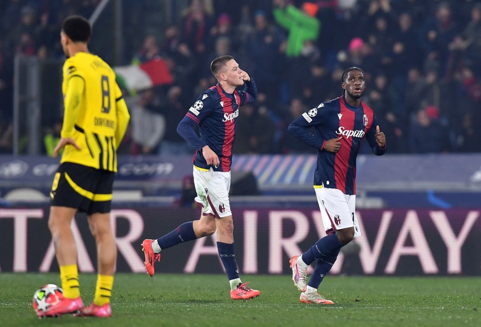 Soccer Football - Champions League - Bologna v Borussia Dortmund - Stadio Renato Dall'Ara, Bologna, Italy - January 21, 2025 Bologna's Samuel Iling-Junior celebrates scoring their second goal with Emil Holm REUTERS/Jennifer Lorenzini