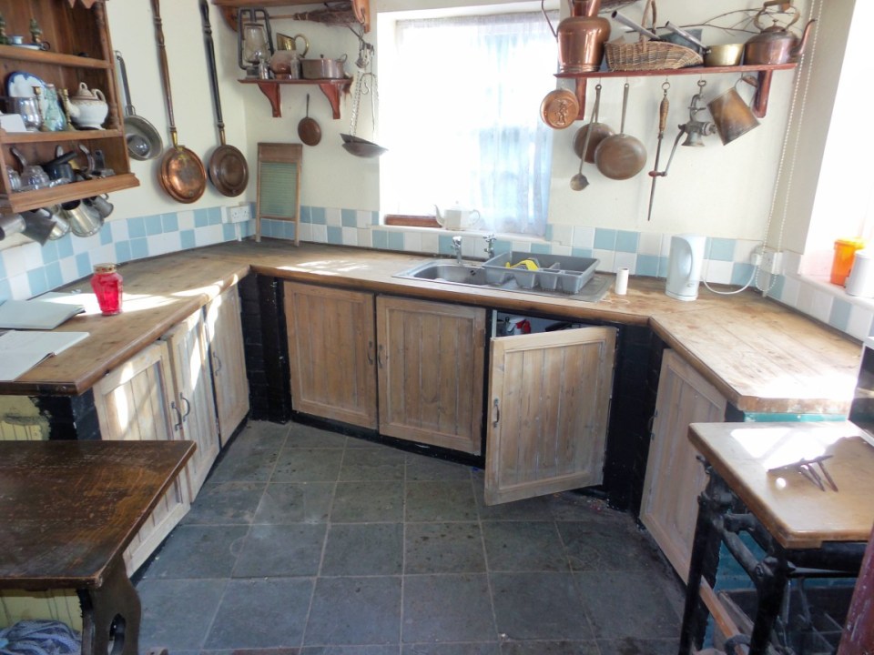 The kitchen. Essex's last witch Ursula Kemp was jailed in this house in Clacton-On-Sea. (file photo) See SWNS story SWCAhaunted. Britain's most haunted house has finally been sold for ¿240,000 - 12 YEARS after the owner first put it on the market. Vanessa Mitchell has owned the two-bedroom cottage, The Cage, since 2004, and frequently reported seeing ghostly goings-on at the home, part of which was used to hold prisoners accused of witchcraft in the 16th century. Vanessa claimed she had to flee the house after she was physically attacked by spirits, was pushed over while pregnant, and witnessed mysterious blood spatterings appear and a 'satanic goat.' She decided to move out of the house in 2008, a former medieval jail, just four years after buying it.