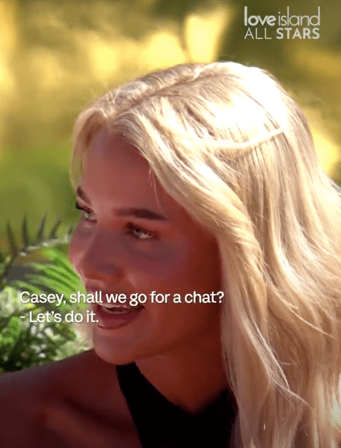 Screenshot of Love Island All Stars: a blonde woman says, "Casey, shall we go for a chat? - Let's do it."