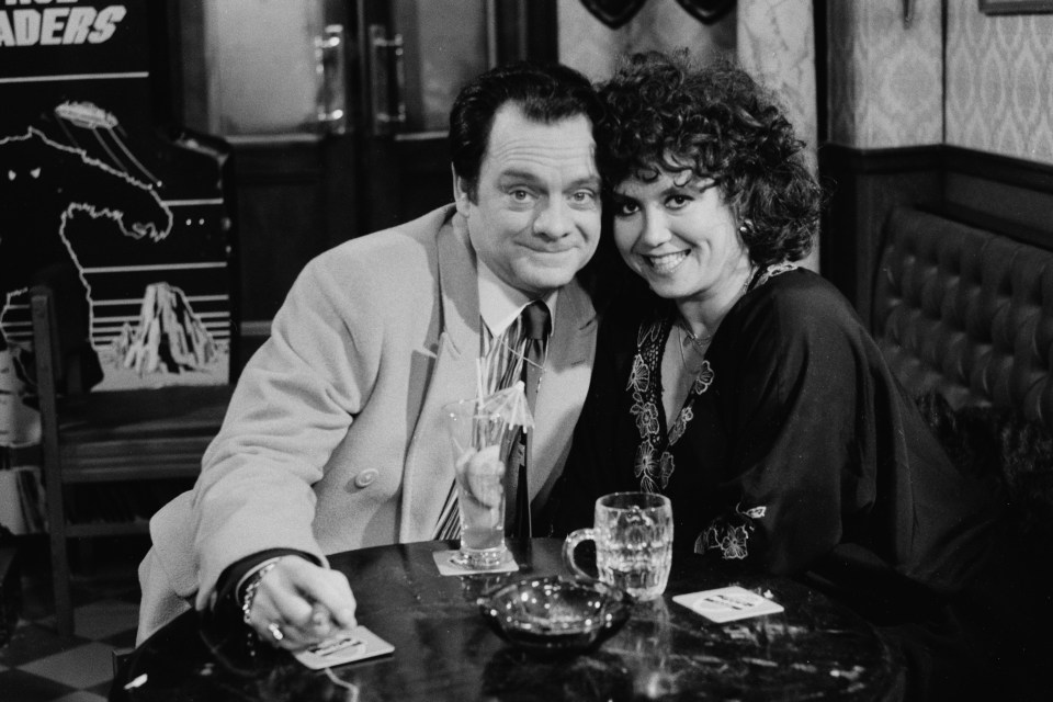 Black and white photo of David Jason and Diane Langton filming a scene for *Only Fools and Horses*.