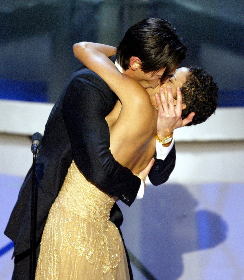 Adrien Brody kissing Halle Berry.