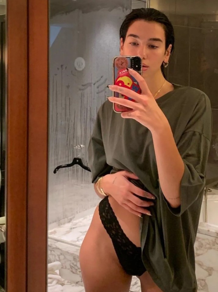 Dua Lipa mirror selfie.