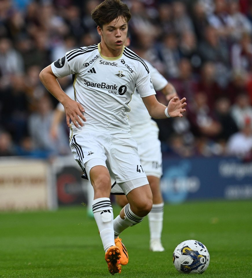 Soccer player dribbling the ball.