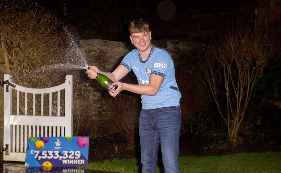 A lottery winner celebrating with champagne.