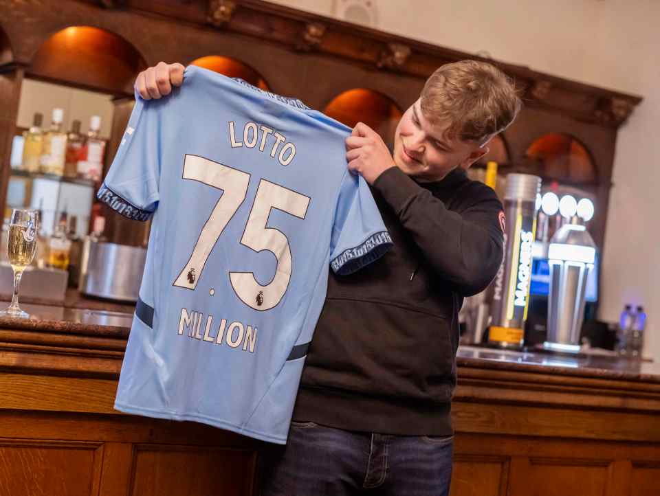 A National Lottery winner celebrating with champagne.