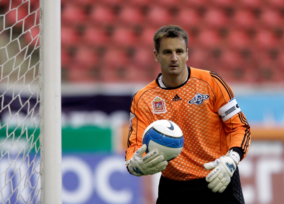 Antonin Kinsky, goalkeeper for FC Saturn Ramenskoe, holding a soccer ball.