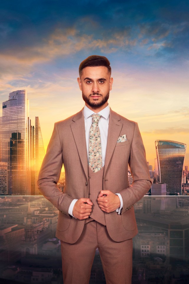 Carlo from The Apprentice, wearing a suit, in front of the London skyline.