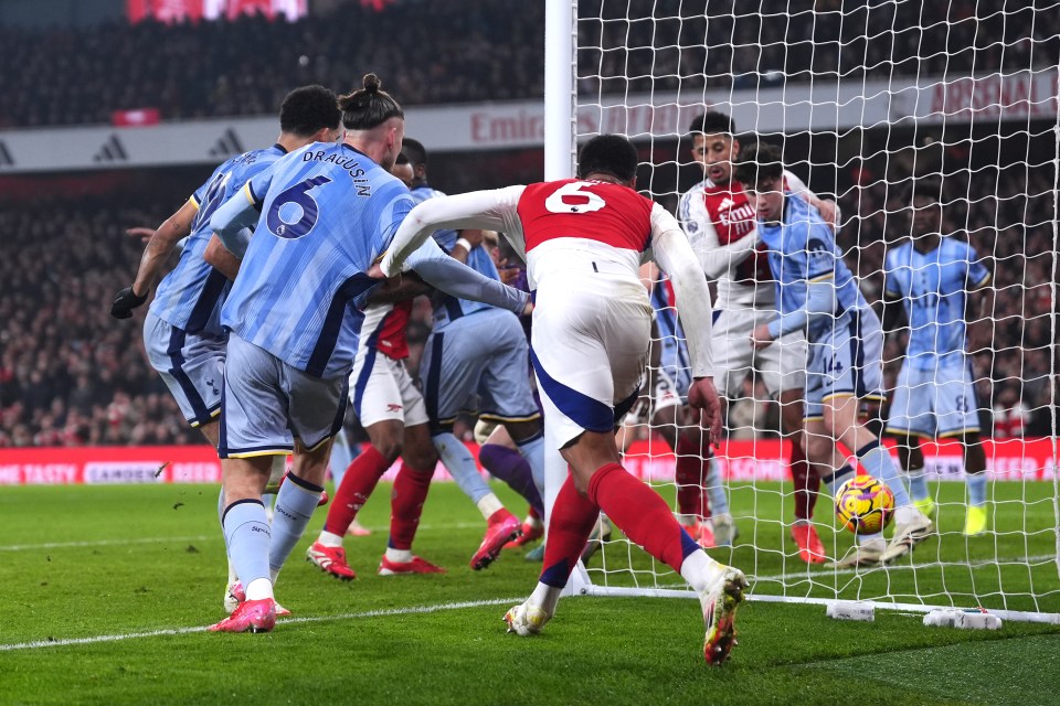 Arsenal's Gabriel scores a goal during a Premier League match.