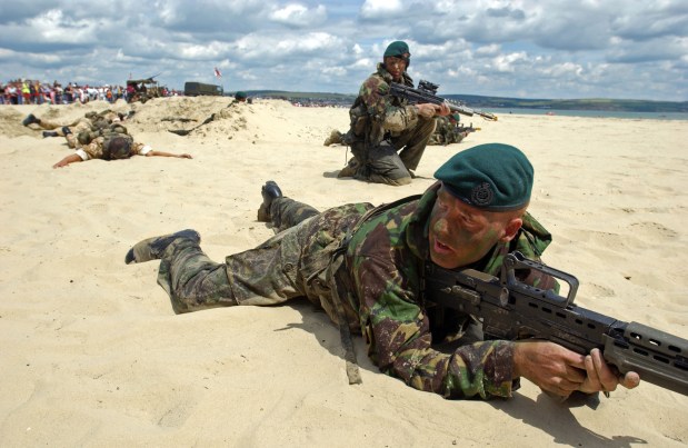 Royal Marines in uniform at a parade.