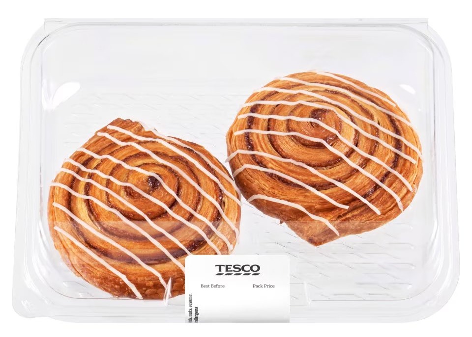 Two Tesco cinnamon swirls in a plastic container.