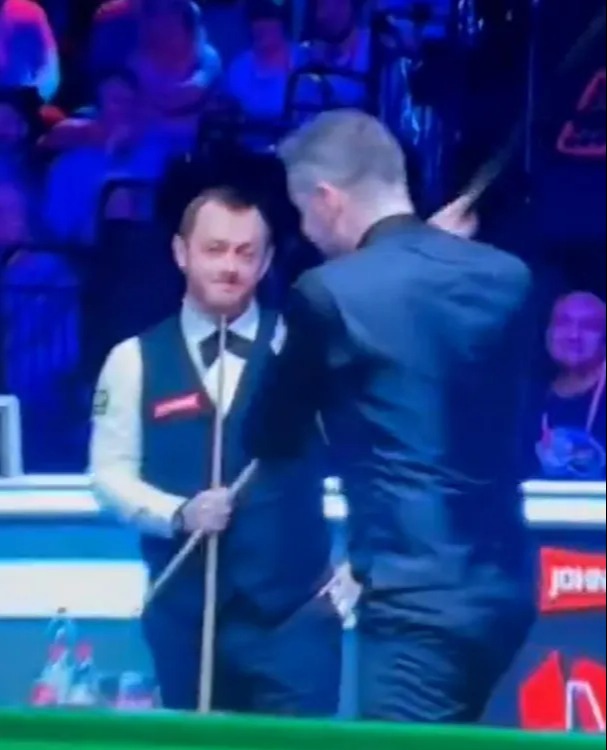 Mark Allen and Mark Selby during a snooker match.