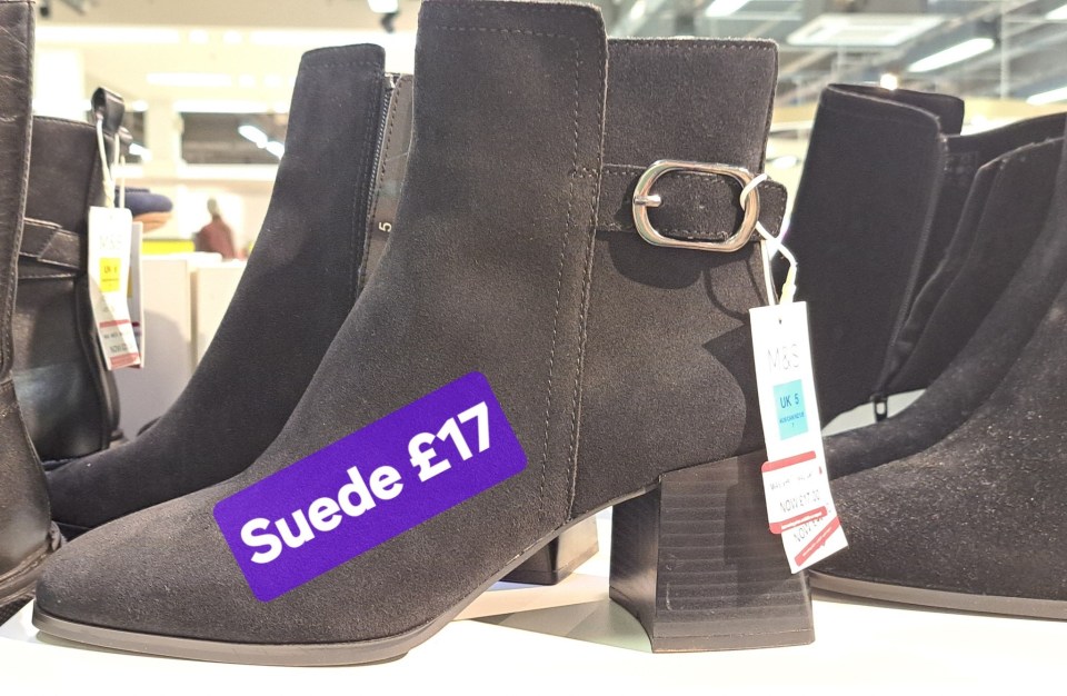 Black suede boots with a buckle, priced at £17.