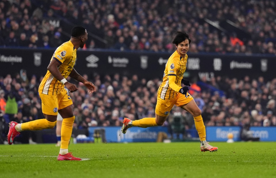 Kaoru Mitoma celebrating a goal during a soccer match.