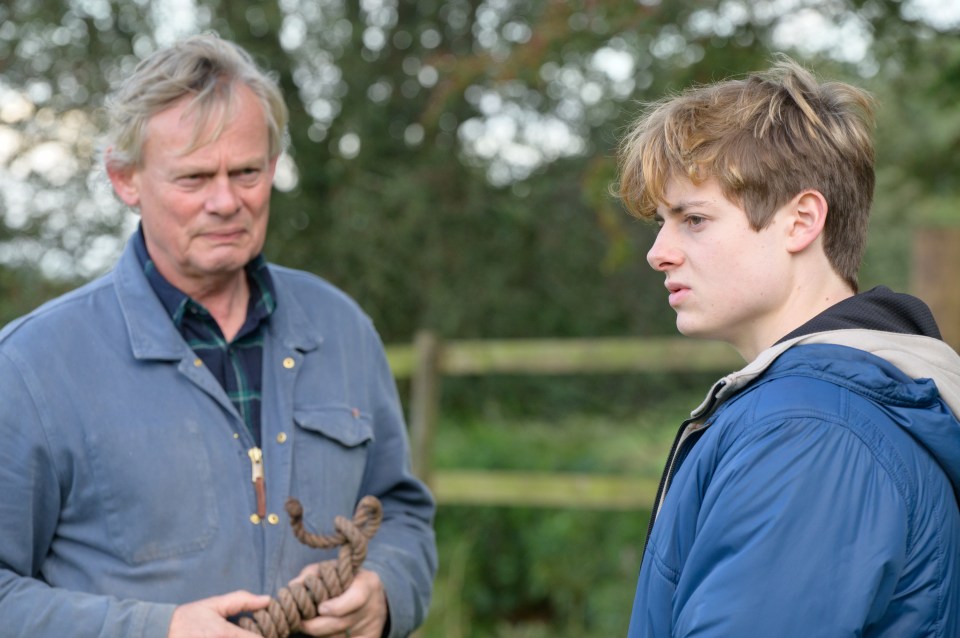 Martin Clunes and Louis Ashbourne Serkis in a scene from Out There.