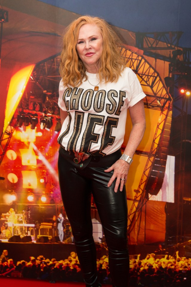 Carol Decker of T'Pau at a festival, wearing a "Choose Life" t-shirt.