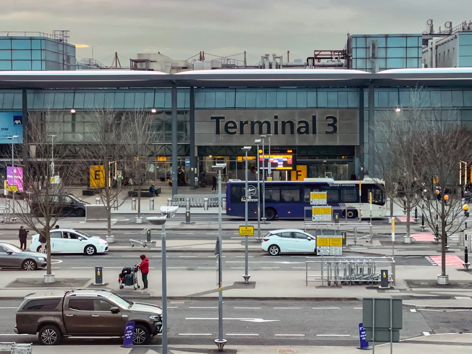 Cars and bus outside Heathrow Airport Terminal 3.