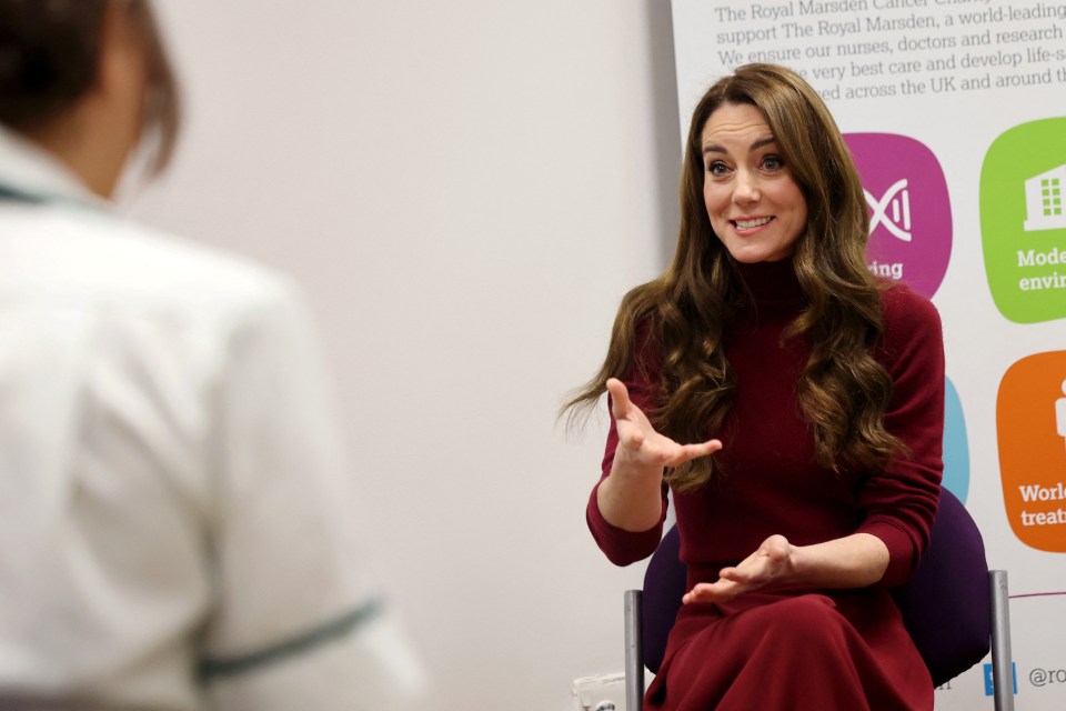 Catherine, Princess of Wales, speaking with hospital staff.