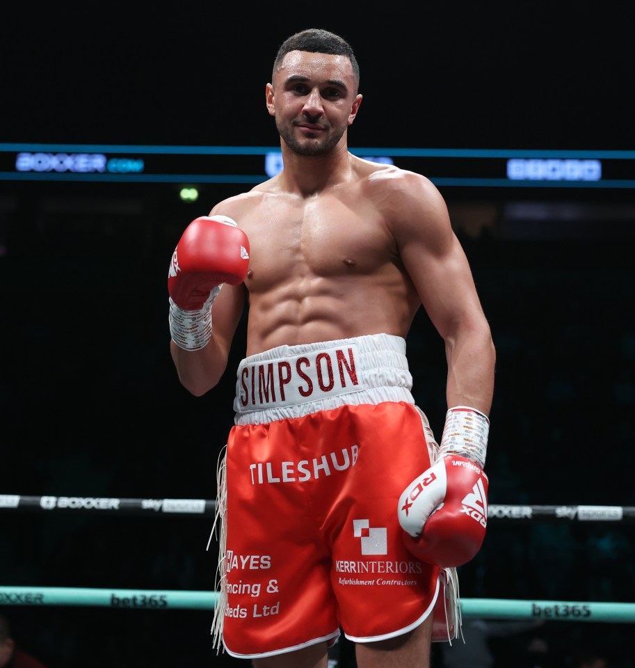 Boxer Callum Simpson victorious in a fight.