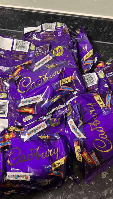 Multiple bags of Cadbury chocolate multipacks.