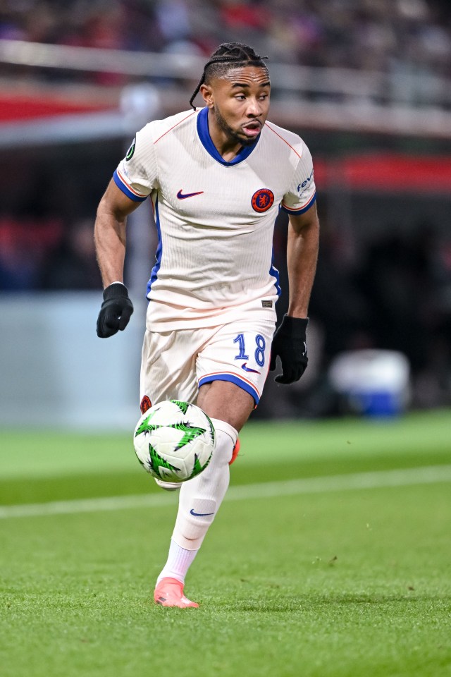 Christopher Nkunku of Chelsea FC controls the ball during a soccer match.