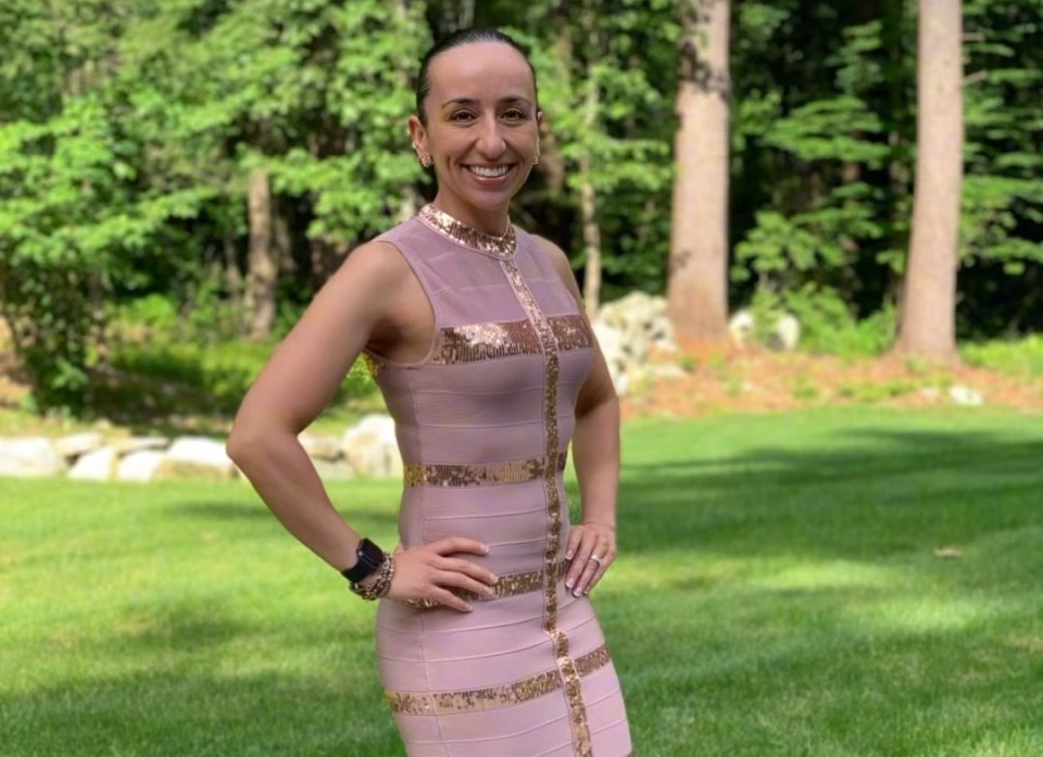 Woman in a pink dress.