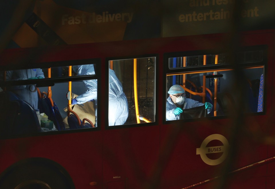 Forensic officers combing the bus on Tuesday evening