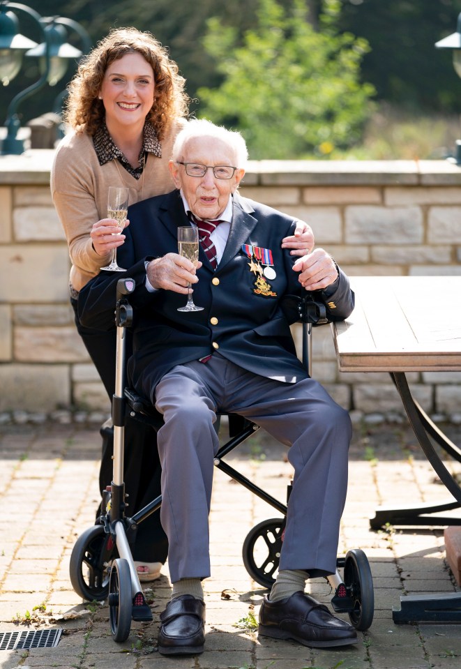 Cpt. Tom Moore celebrating with his daughter after raising over £12 million for charity.