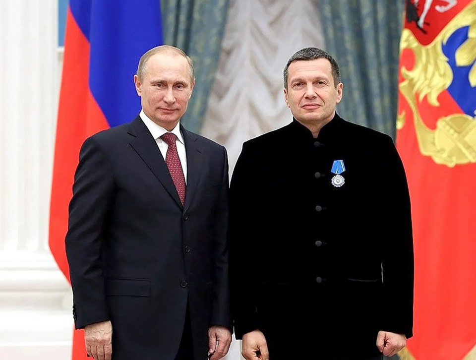 Vladimir Putin and Vladimir Solovyov.