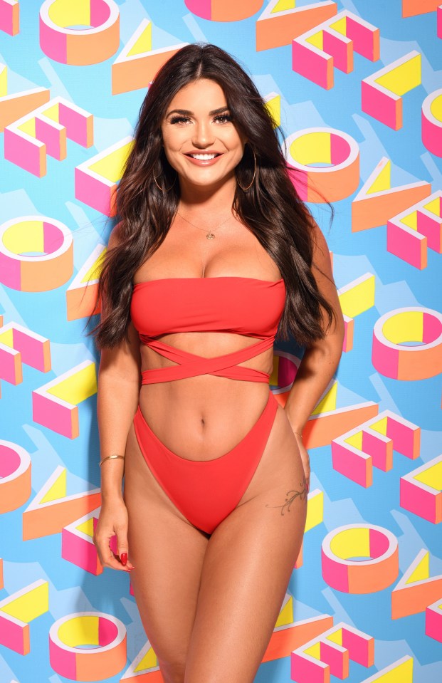 India Reynolds in a red swimsuit, Love Island Series 5 promotional image.