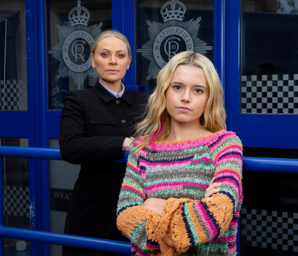 Lisa Swain and Betsy Swain in Coronation Street, standing outside a police station.