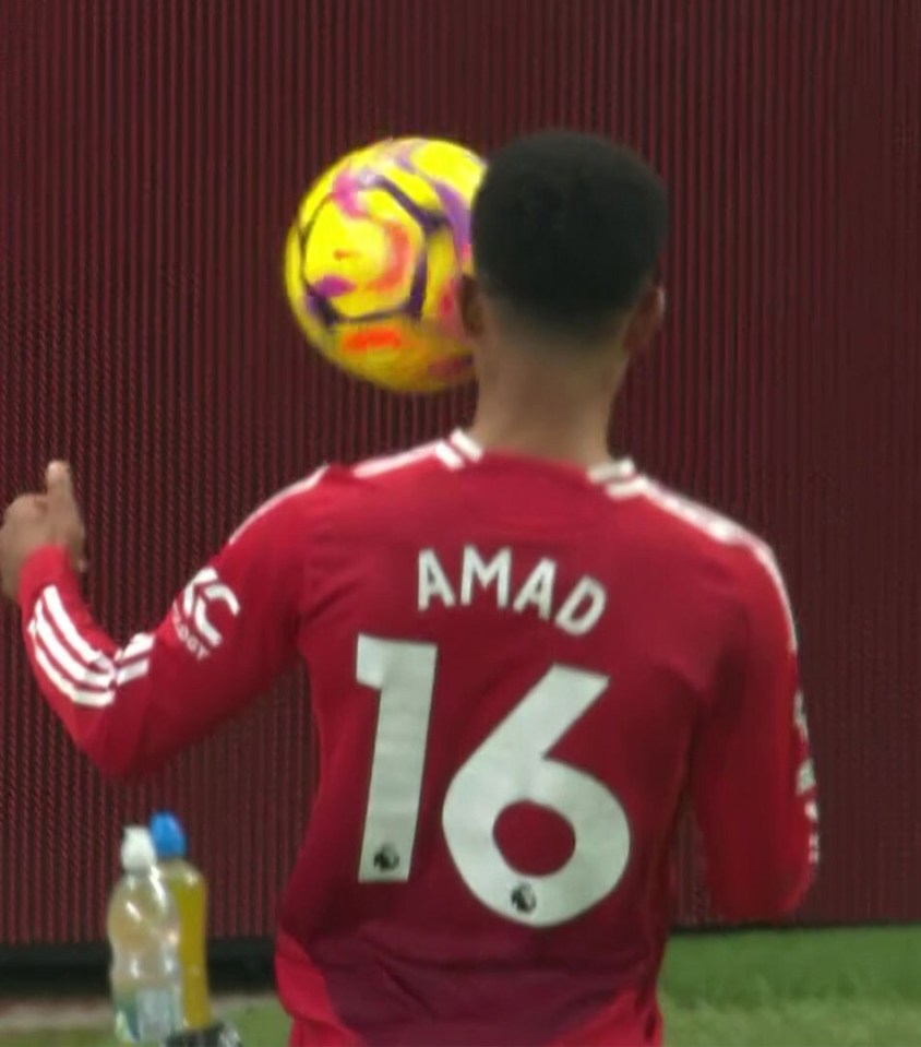 Antony (21) and Amad (16) juggling a soccer ball.