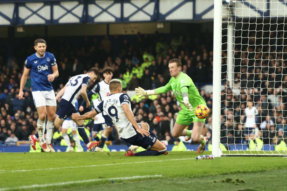 Richarlison scoring a goal during an Everton v Tottenham Hotspur Premier League match.