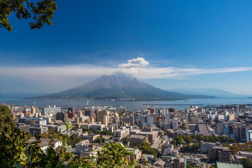 Kagoshima city in Japan, with Sakurajima volcano in the background.