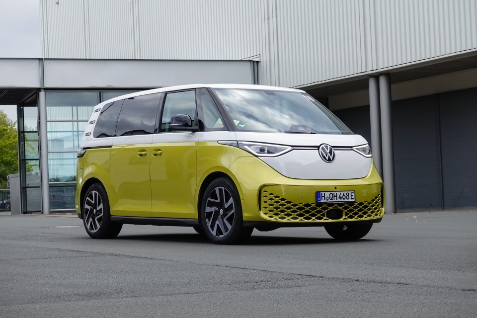 Volkswagen ID. Buzz electric minivan on a city street.