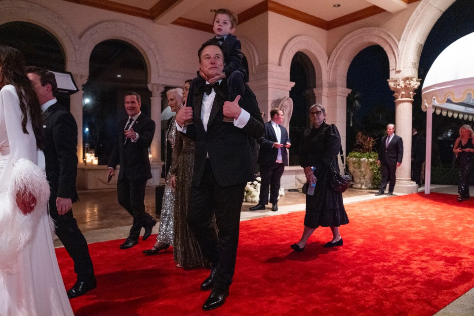 Musk and his son, X AE A-Xii, arrive to a New Year’s Eve party hosted by Trump