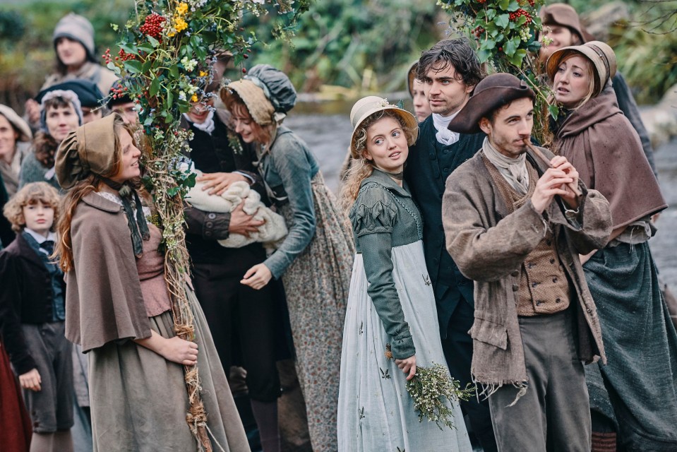 Scene from Poldark, featuring several people in period costume.