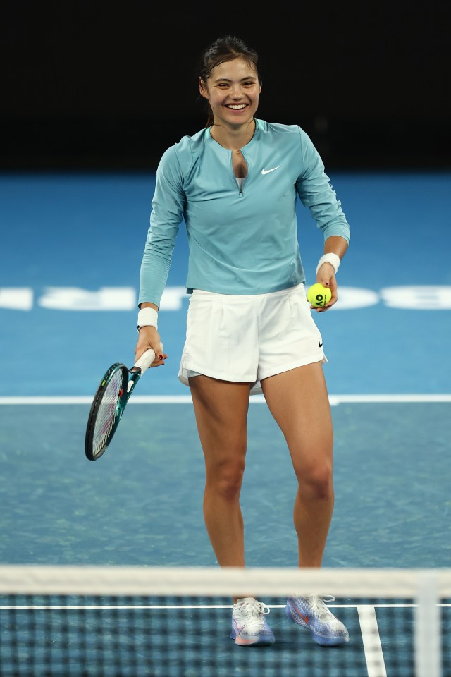 Emma Raducanu smiles during a tennis practice session.