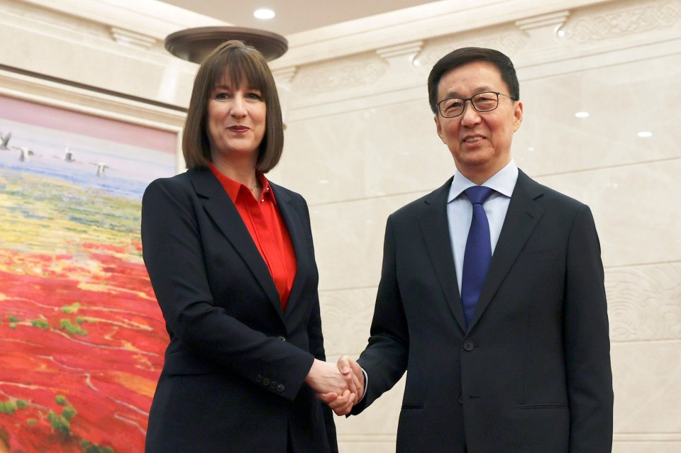 Rachel Reeves and Han Zheng shaking hands.