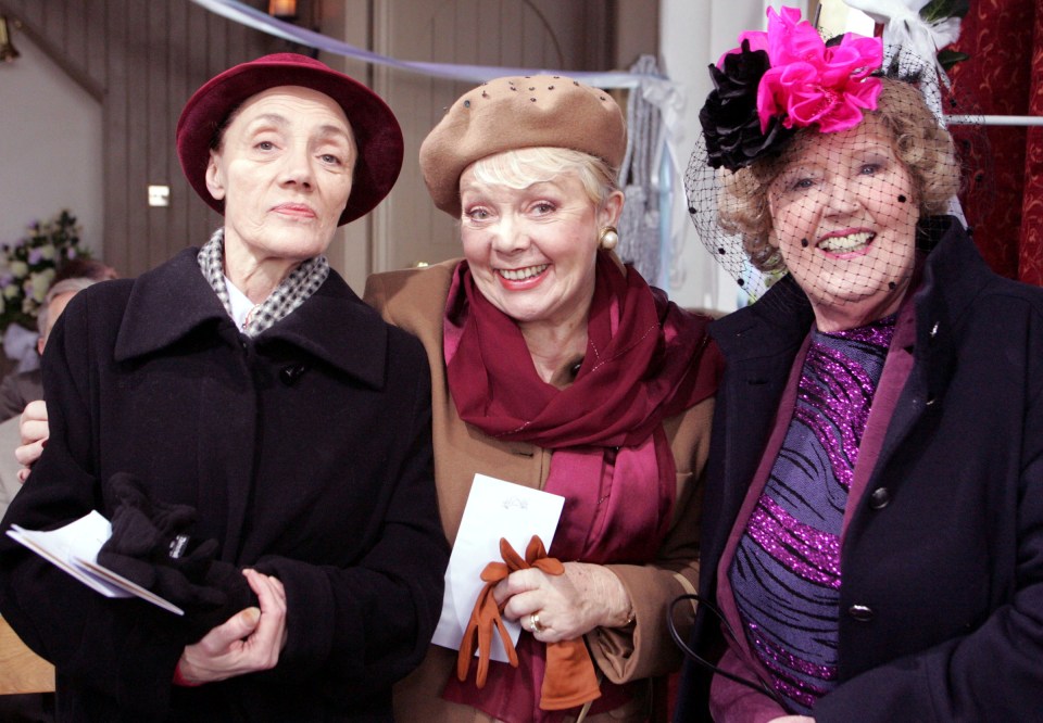 Three women at a wedding.