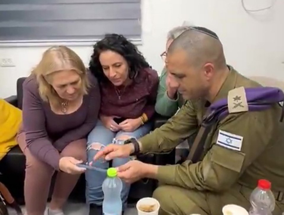 Hostage families in Gaza and Israel meet with a soldier.