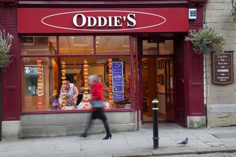 Oddie's Family Bakery storefront with Halloween decorations.