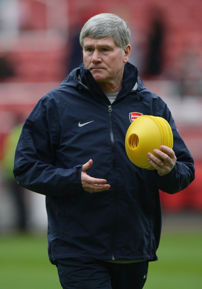 Pat Rice, Arsenal assistant manager, holding yellow cones.