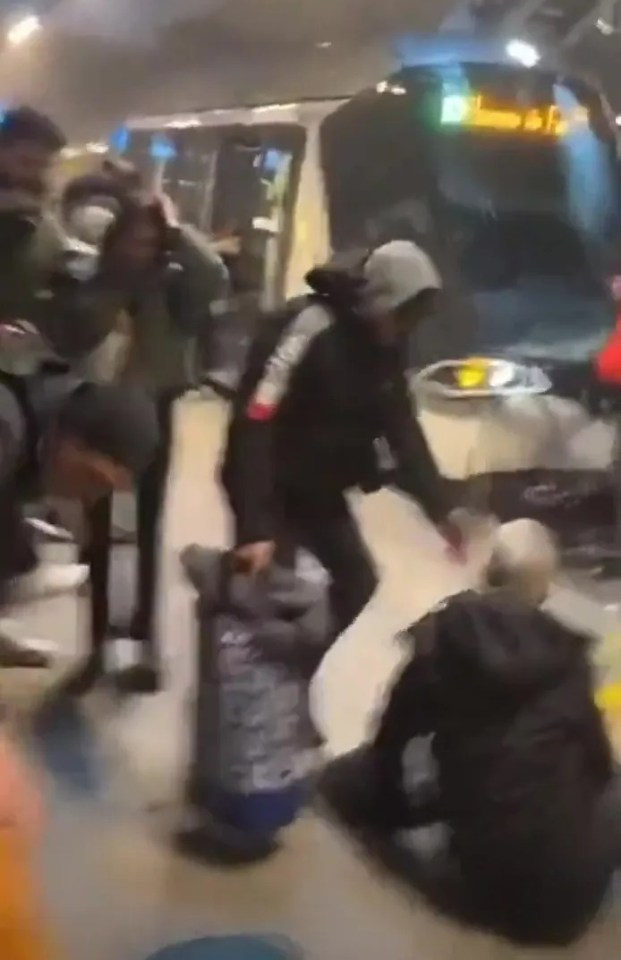 Aftermath of a tram collision in Strasbourg, showing injured people and emergency responders.