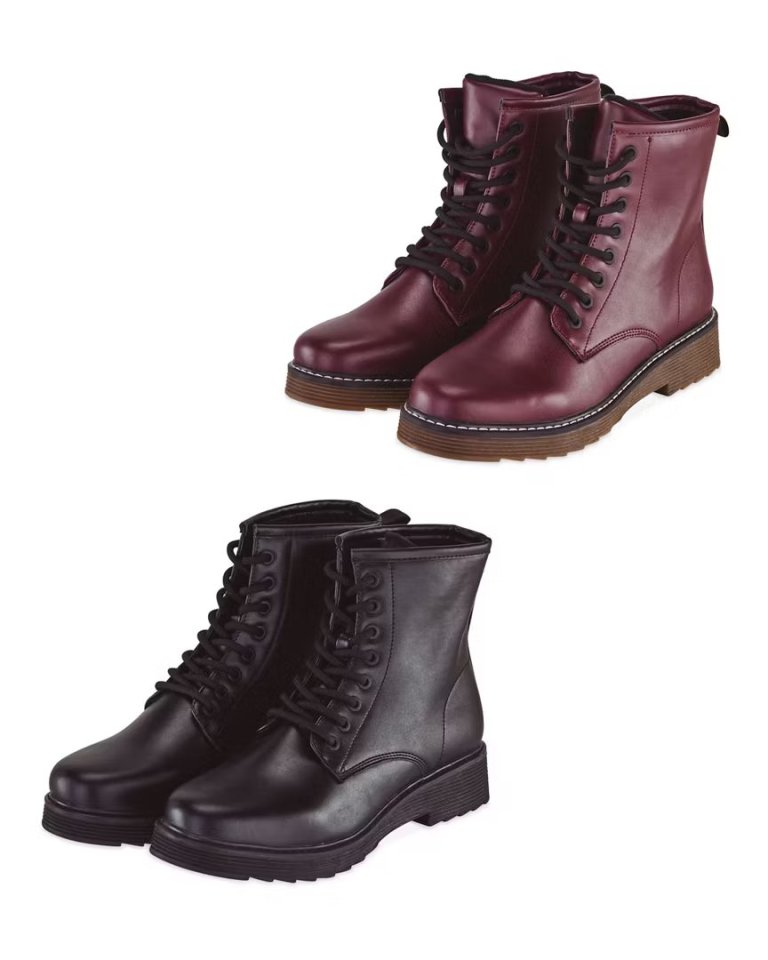 Pair of burgundy and black lace-up boots.